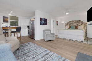 The studio is designed to feel open and spacious, combining living, dining, kitchen and a bedroom space in one open concept.