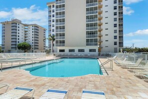 The community offers 2 heated pools, a kiddie pool, spacious sundecks and lounge seating; this one is located behind building 4.