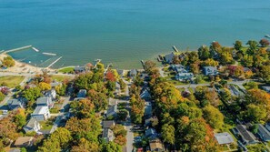 Cozy cottage a block from Chesapeake Bay - with 2 bedrooms and 2 baths, outdoor living, and all the comforts of home.