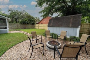 Large Fenced in Backyard with Firepit