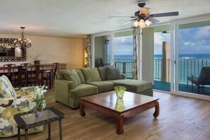 Large great room with amazing ocean views that include dinning, living and kitchen areas. (1)