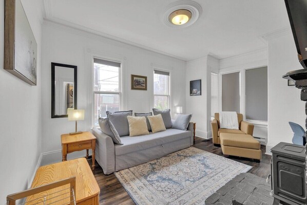 As you enter the living room.