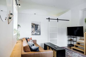 The living room as you enter your space.