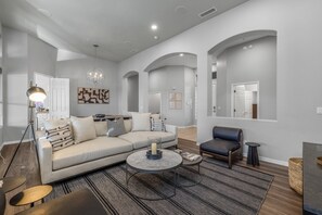 Main Living Room- comfortable  furnishing including and a 55” Smart TV