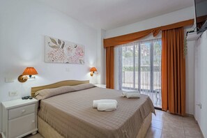 Master Bedroom with a Queen Size Bed, Flatscreen Smart TV, Wardrobe
