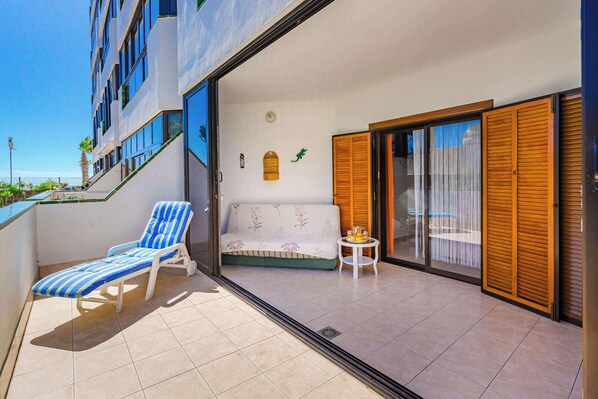 Spacious Terrace with Sunbed & Seating Area