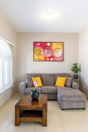 Bright and spacious living room with modern decor
