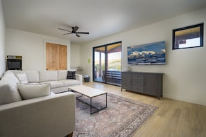 Upper Level Living Area W/ 65" HDTV and Arcade