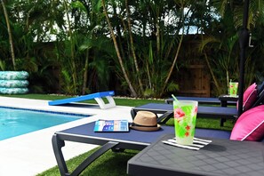 Relax by the pool, catch up on your favorite read