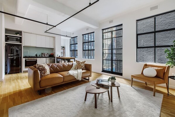 Doors off the living space open to the outdoors, adding to its urban vibe.
