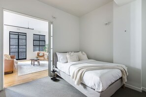 Sleep easy in the cosy double bed. Sliding doors create privacy from the living space.
