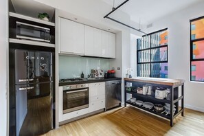 The compact kitchen comes equipped with everything you’ll need to prepare meals at home.
