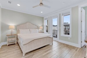 3rd Floor - King Suite with ensuite bathroom, private balcony, and 2 twin bunk beds