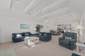 Top-Level Living Room with Deck Access