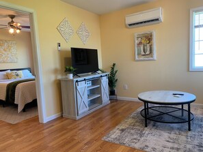 View from the entrance to your right - living room and bedroom.