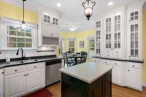 Spacious kitchen with plenty of counter space and a large island.