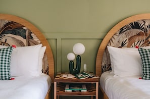 A cozy retreat adorned with playful details, offering a sense of comfort and charm for a peaceful night's rest.