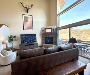 Spacious great room with cathedral ceilings and lots of natural light