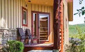 Welcoming front door entrance with protected, private porch