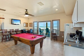 Spend hours in the Game Room engaging in some friendly competition with the Pool Table, LCD TV, stereo, and Wet Bar with a Full Refrigerator.