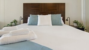 Comfortable bedroom with plush bedding