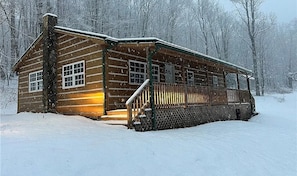 The cabin couldn’t be any cozier during wintry days!