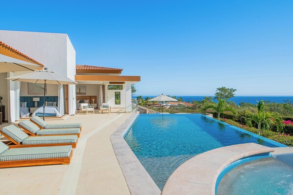 Gorgeous poolside patio with ocean view