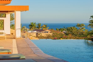 Poolside patio with ocean view
