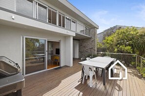 Outdoor dining for 7 with BBQ - deck is off the downstairs living/kitchen area