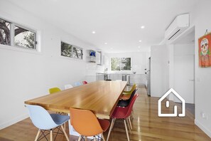 Downstairs open plan living; kitchen and dining with indoor dining for 12