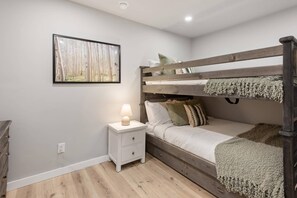The bonus sleeping room offers a set up full-size bunks ideal for children and teens or a single adult.