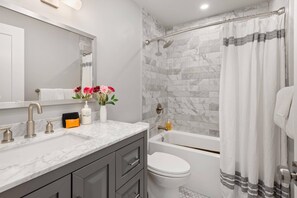 The bathroom offers a combination tub and shower and is recently remodeled for your comfort.