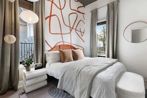 Elegant and Peaceful Bedroom Featuring a King-Sized Bed