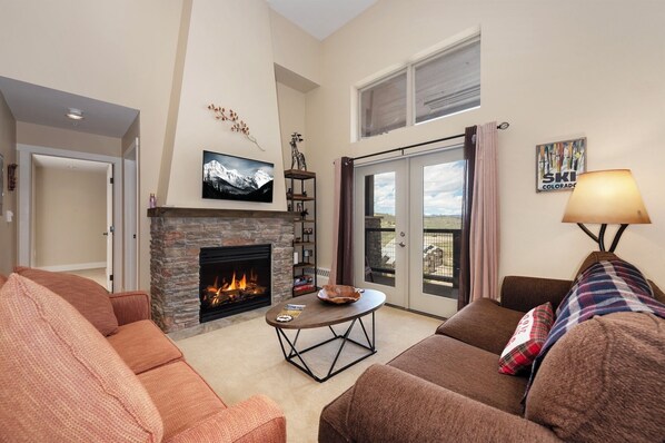 Kick back and enjoy our cozy, comfortable living room featuring a 42" smart TV