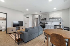 Living room and fully equipped kitchen