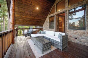 Unwind on the patio with plush sofas and comfortable seating.