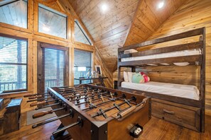Challenge friends to a foosball match, relax on cozy bunk beds, and enjoy a perfect space for laughter, bonding, and great memories.