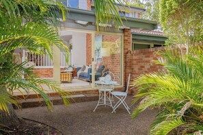 Private courtyard garden, a perfect retreat for outdoor dining or morning coffee.
