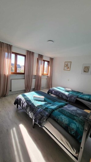 Bedroom 1 | 2 comfortable single beds with wardrobe (2)