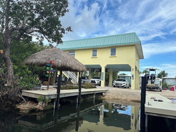 The view from our quiet canal with a pull in space for a boat.
