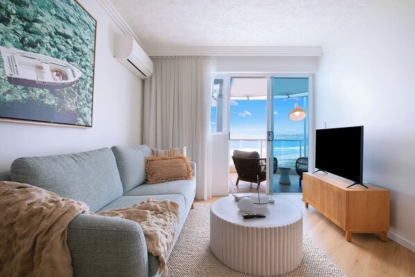 Settle in with some TV or relax with a book in the living area, which offers a cosy sofa for laidback afternoons in air-conditioned comfort. 
