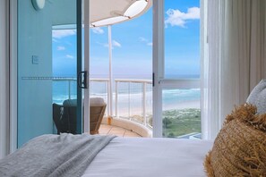 Wake up to the sound of crashing waves—with the bedroom extending to your private beachfront balcony.