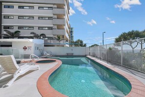 When you aren't hitting the sand and surf, laze by the building's shared pool fronting the beach.