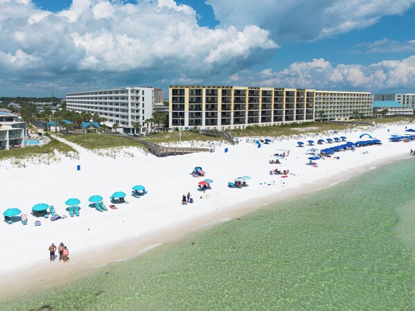 View of beach (condo is white building on the left)