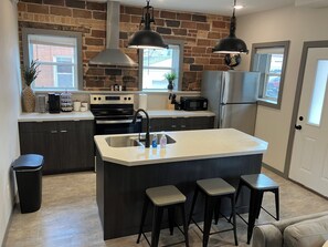 Full kitchen saves money and has utensils needed to make meals.