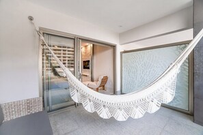Balcony with hammock and love seat