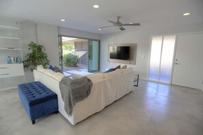 spacious living room with TV
