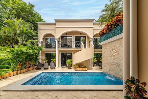 Dive into relaxation at our sparkling swimming pool