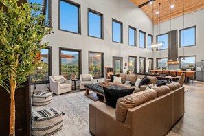 Flooded with natural light, this open-concept cabin beautifully blends indoor comfort with the stunning outdoors.