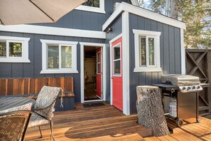 Outdoor fully equipped with tons of seating and a bbq.